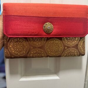 Elegant Red and Brown Clutch